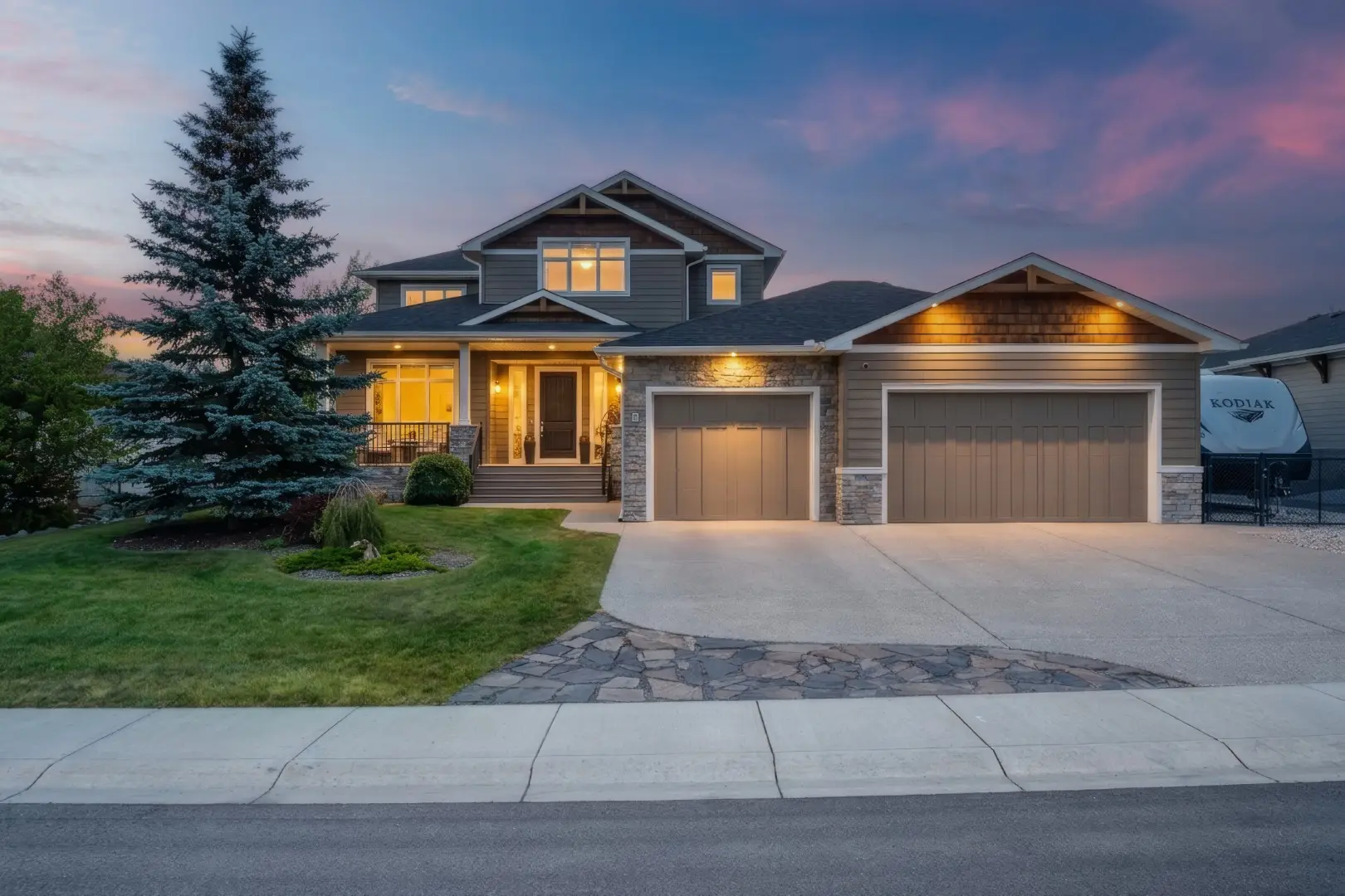 Twilight exterior photograph of a Calgary listing