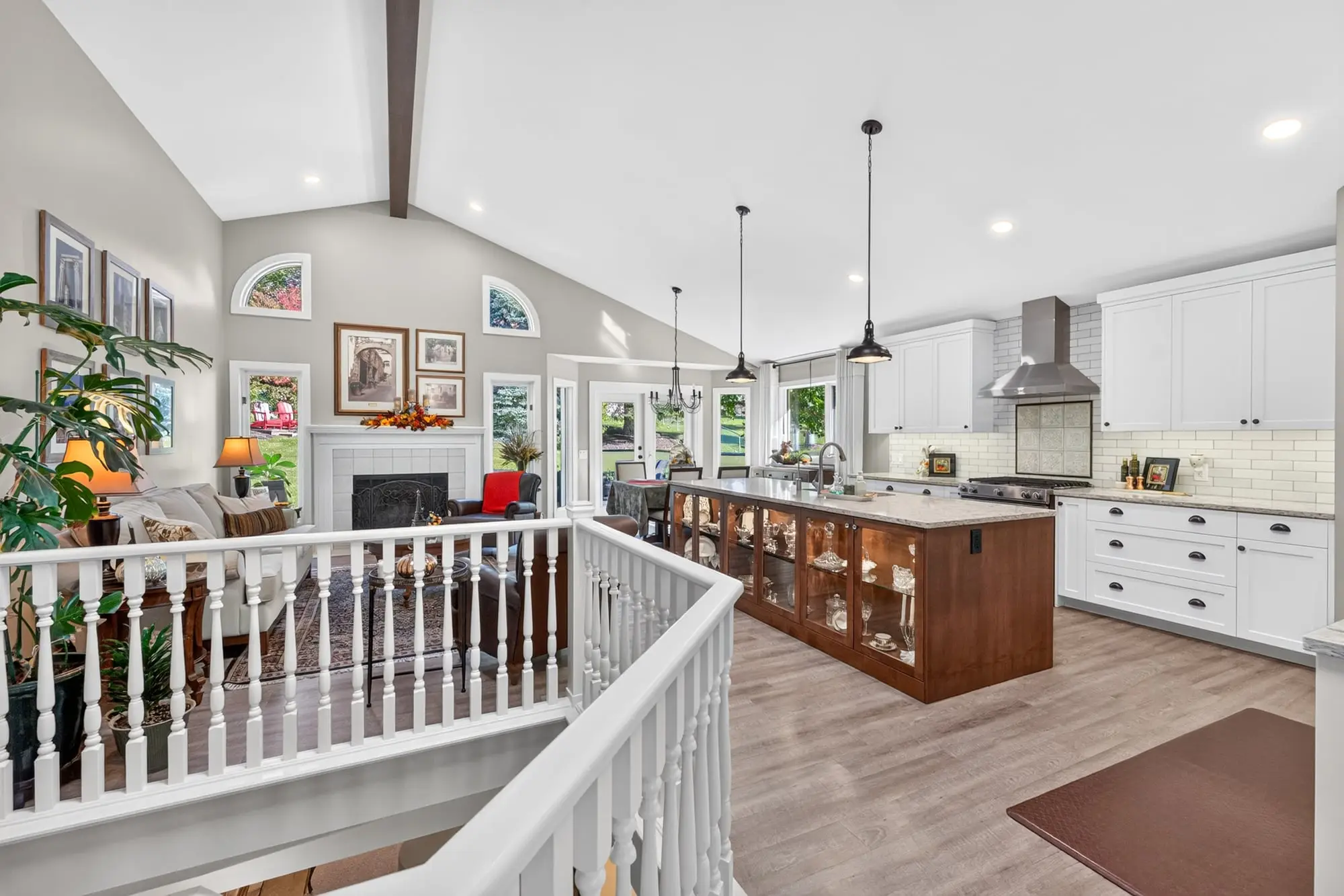 Open-concept main floor under a vaulted ceiling