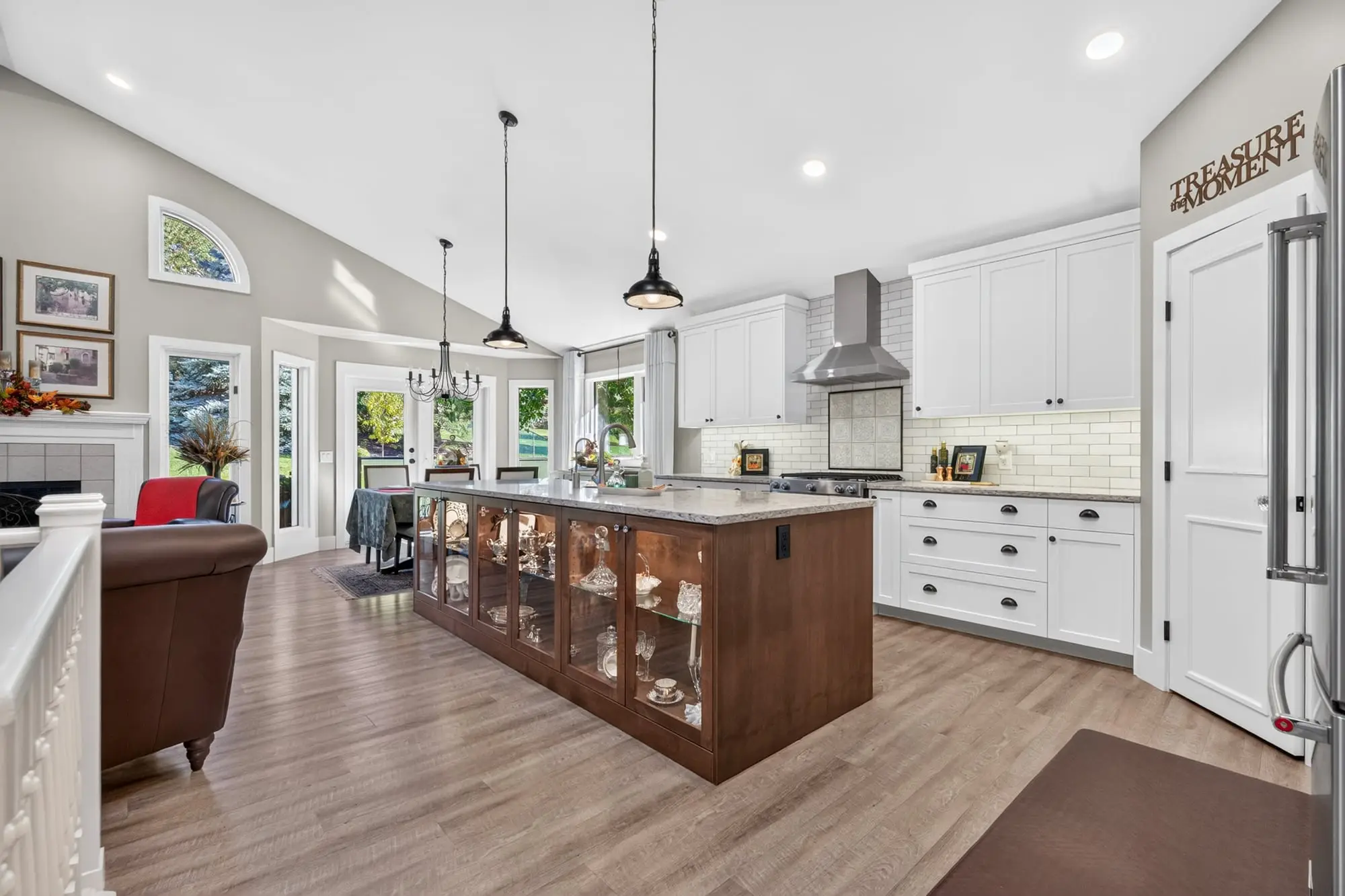 Kitchen island with glass-front cabinetry
