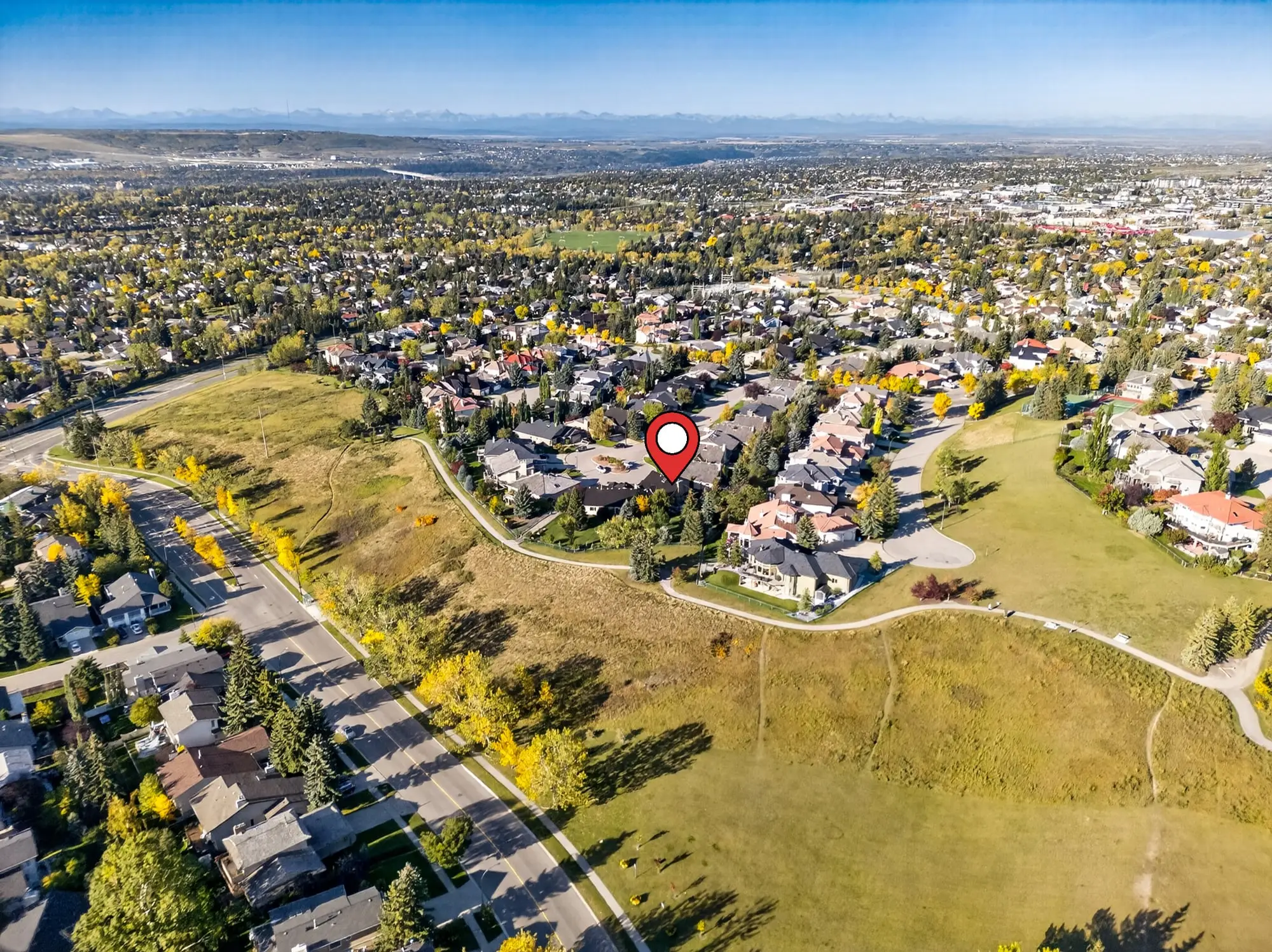 Aerial view with the property pinned beside the park pathway