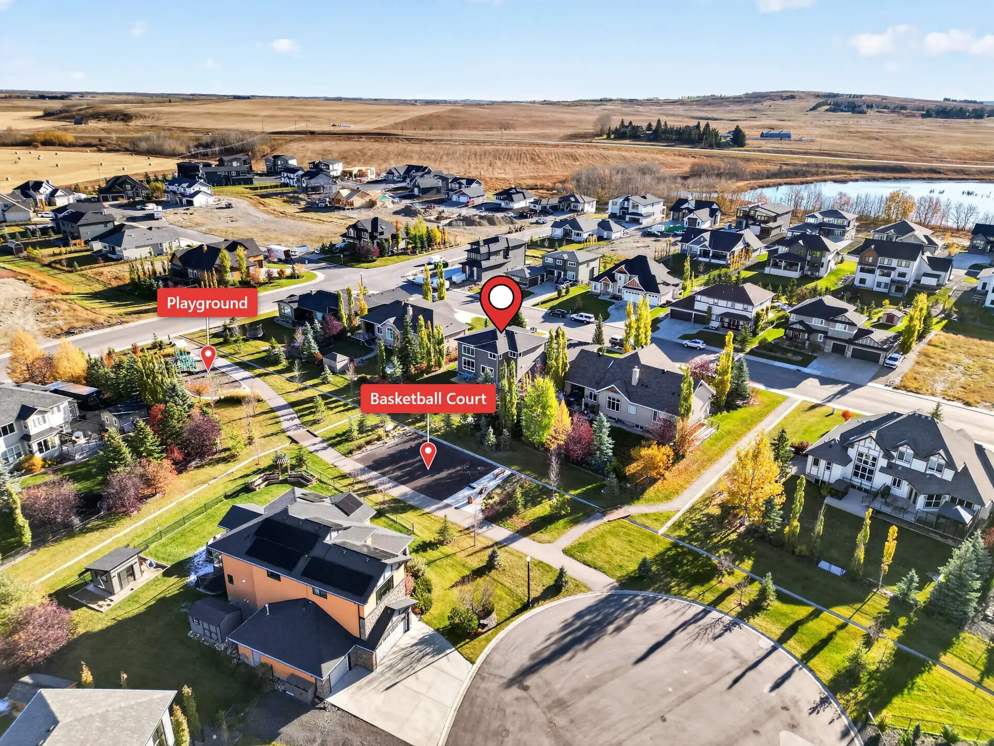 Aerial view of the property and green space