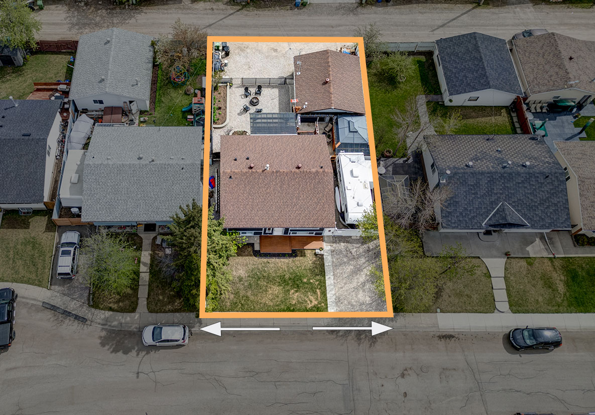 Aerial photograph of a Calgary infill lot with the property boundary highlighted in orange
